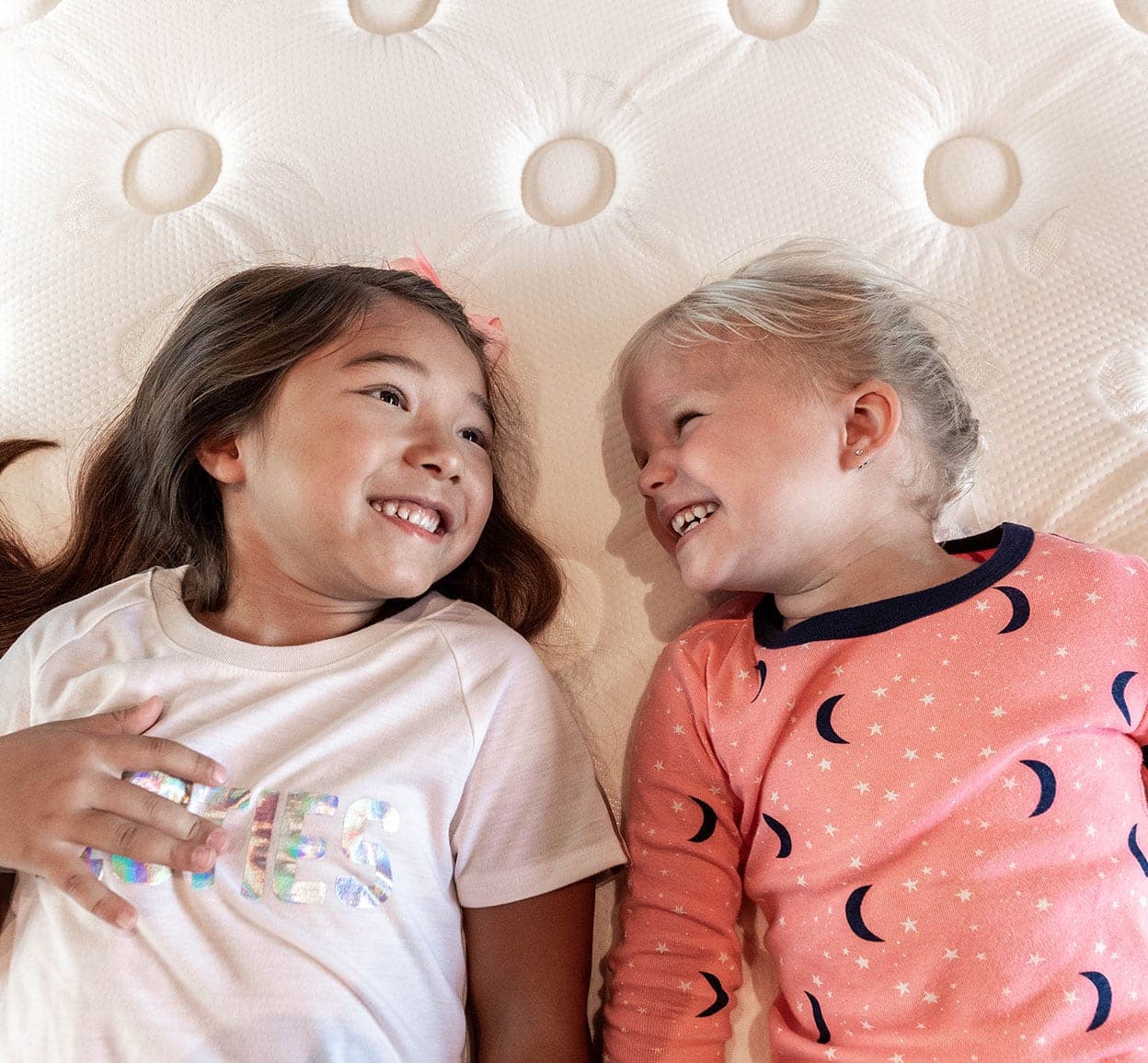 kids enjoying mattress